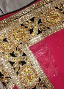 Elegant Pink Saree with Golden Border
