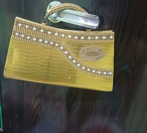 Elegant Gold Embellished Clutch Bag