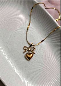 Gold Heart &amp; Bow Pendant Necklace