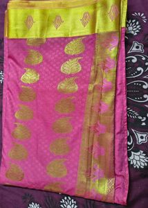 Vibrant Pink Saree with Golden Motifs