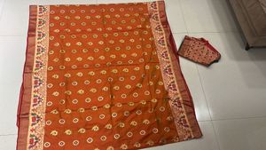 Paithni Orange Saree with Embellished Blouse