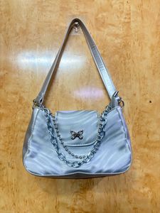 silver shoulder bag