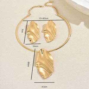 Gold Tone Abstract Leaf Choker Necklace &amp; Earrings