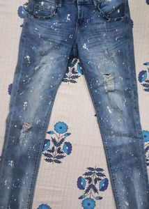Distressed Denim Jeans