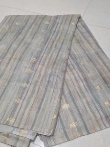 Elegant Striped Saree with Gold Accents