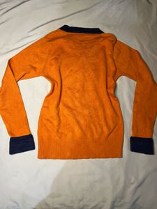 Orange Knit Sweater with Navy Accents