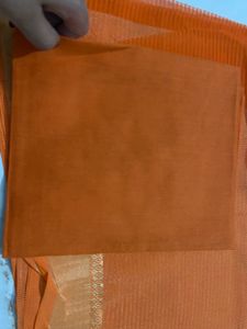 Elegant Orange Saree with Golden Border and  uns