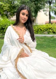 Elegant White Ethnic Gown with Gold Trim