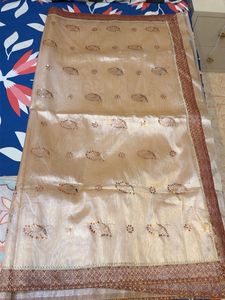 Elegant Beige Embroidered Saree