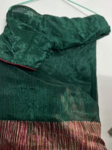 Elegant Green Saree with Red Border