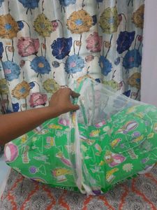 Baby bed with mosquito protection