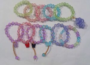 Set of Beaded Bracelets with Charms