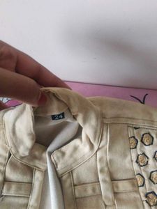 Stylish Black Jeans and cream vest