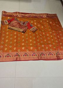 Paithni Orange Saree with Embellished Blouse