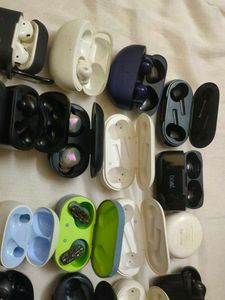 Assorted Earbud Cases and Earbuds