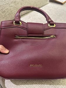 BVLGARI Chic Maroon Handbag with Snake Charm