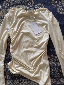 Cream Ruched Turtleneck Top