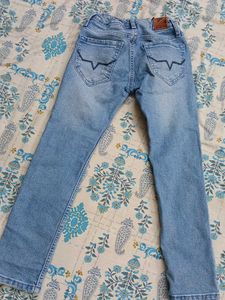 Light Wash Distressed Denim Jeans