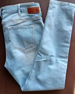 Light Wash Jeans with Green Stripe