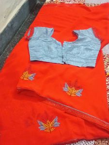 Vibrant Red Saree with Leaf Motifs