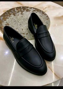 Classic Black Gucci Loafers