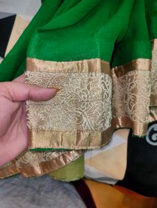 Elegant Emerald Green Saree with Gold Border