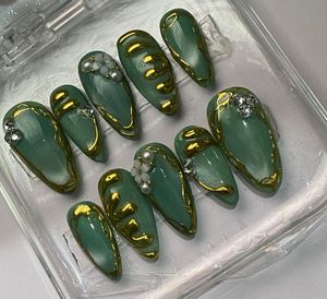 Cat Eye Press-On Nails with Gold Swirls