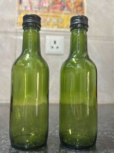 Set of 2 Green Glass Bottles