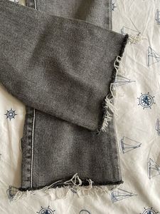 Grey Flare Jeans with Distressed Details