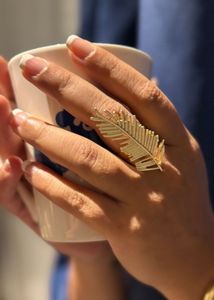 Elegant Gold Feather Ring &amp; Bangle Set