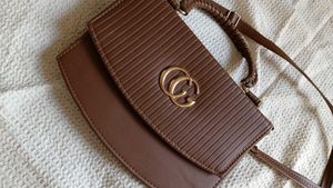Chic Brown Handbag with Gold Logo