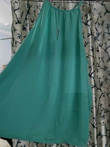 Sleveless & Backless turquoise coloured A-line top