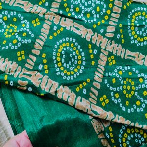 Elegant Cream  dress material with Green Bandhani