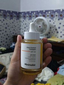 Minimalist Frizz Control Hair Serum SPF 30 and fac