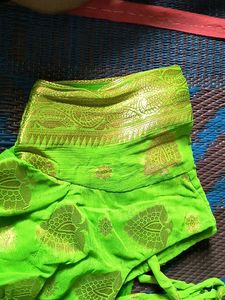 Vibrant Green Saree with Golden Motifs