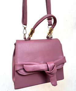 Chic Pink Handbag with Bow Detail