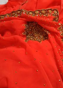 Elegant Orange stone Saree with stitched blo