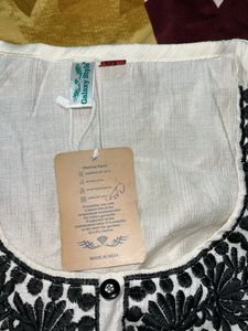 Elegant White Kurta with Black Embroidery