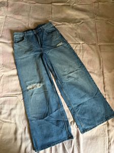 Wide Leg Ripped Jeans waist- 32 length- 102 cm