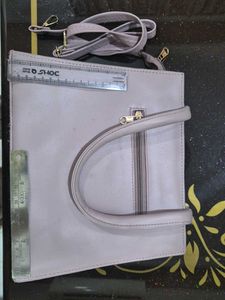 lavender handbag with sling strap