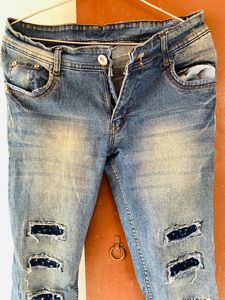 BRAND NEW FADED BLUE DISTRESSED SLIM FIT JEANS FOR WOMEN