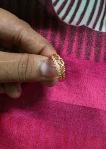 Delicate Gold Ring with Subtle Embellishments