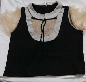 Chic Black Top with Tulle Sleeves
