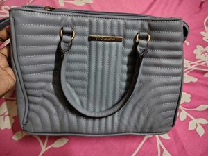 Marie Claire Chic Grey Quilted Handbag