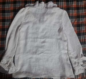 Chic White Ruffled Blouse with Black Bow