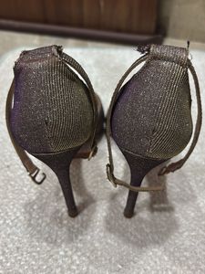 shiny pair of stelletoes