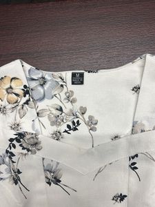 Floral Peplum Blouse with Embellished Waist