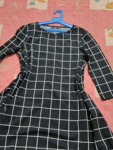 SHEIN Black checkered A-line dress.