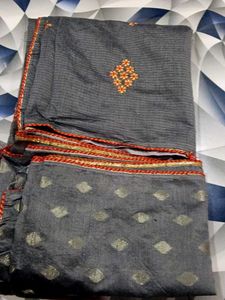 Elegant Grey Saree with Orange Motifs.. no blouse