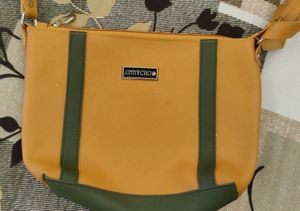 Jimmy Choo Mustard Sling Bag: Chic Style Statement